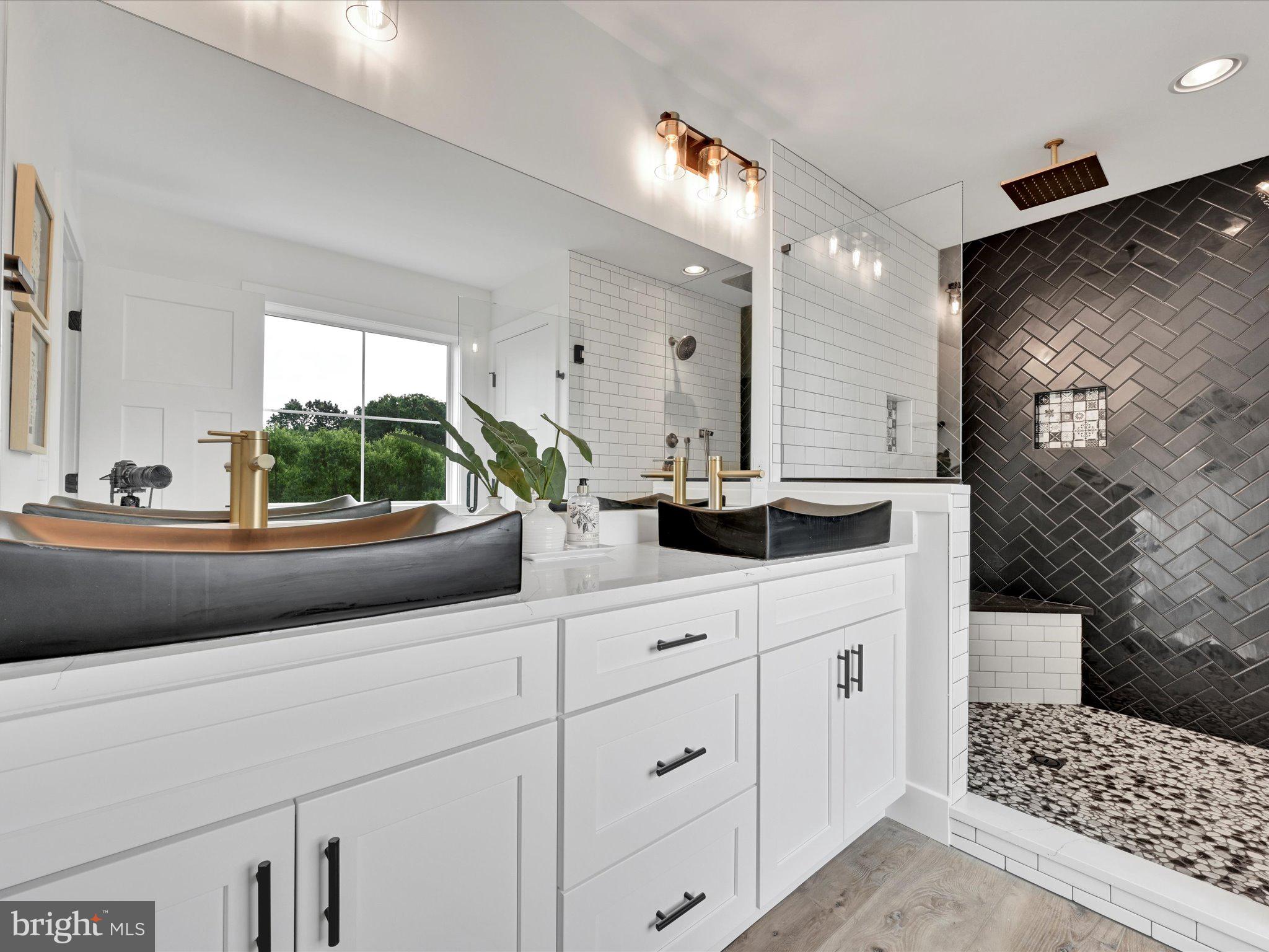 335 Royal Hunt Way Lititz, PA 17543 - Photo 28 of 49 a bathroom with a sink and a mirror