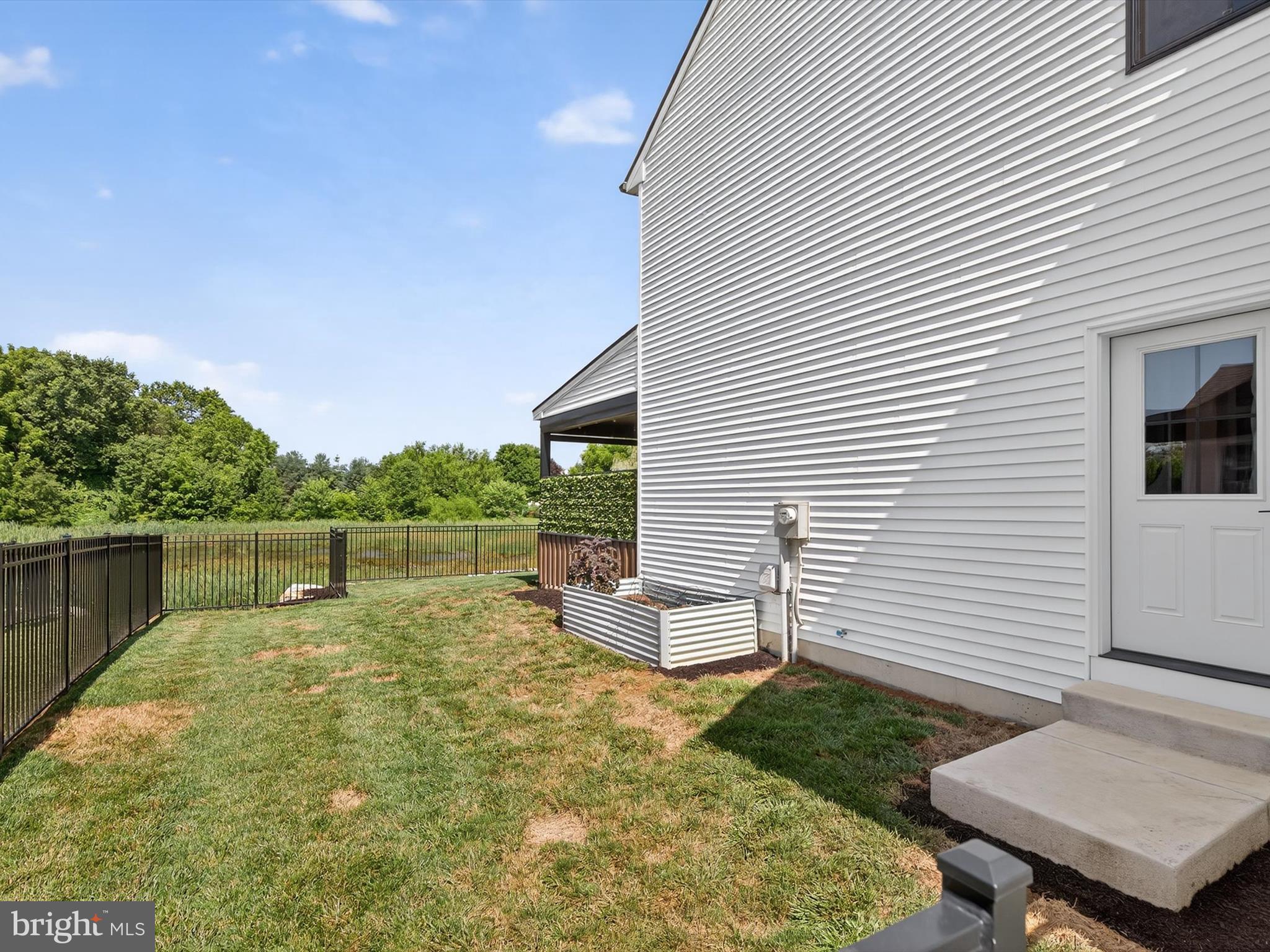 335 Royal Hunt Way Lititz, PA 17543 - Photo 38 of 49 a view of a backyard with sitting area