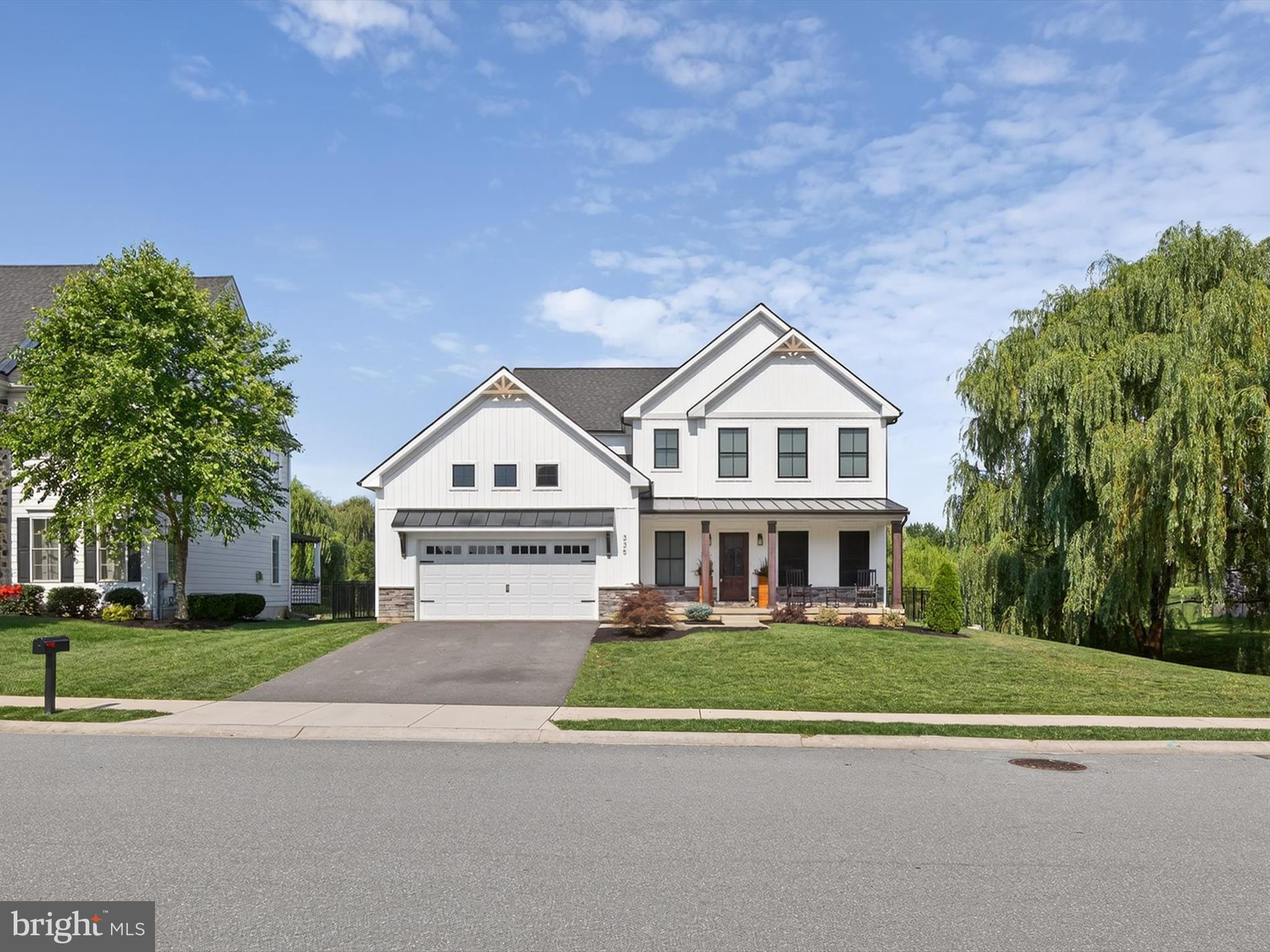 335 Royal Hunt Way Lititz, PA 17543 - Photo 4 of 49 front view of a house with a street