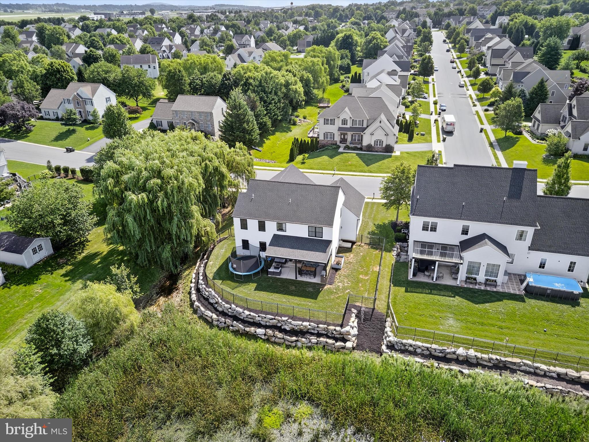 335 Royal Hunt Way Lititz, PA 17543 - Photo 48 of 49 an aerial view of a house with swimming pool a yard and outdoor seating
