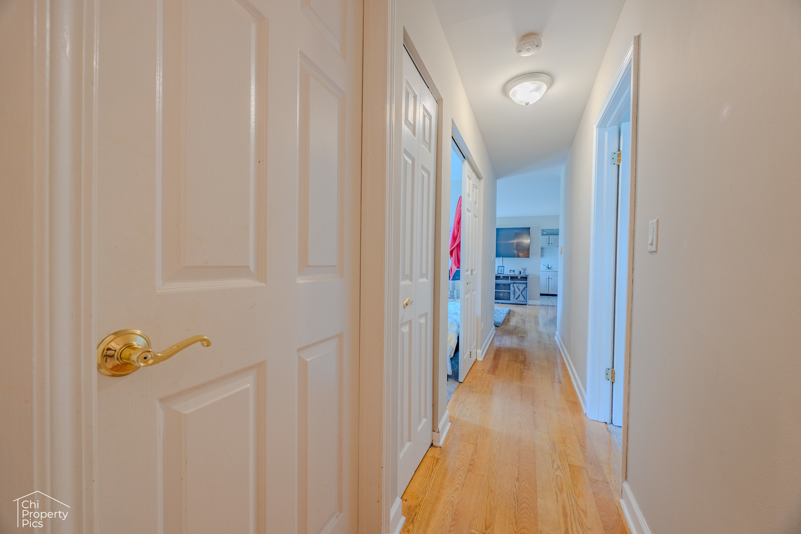 630 Cumberland Trail, Unit AA1 Roselle, IL 60172 - Photo 18 of 23 a view of a hallway with wooden floor and staircase