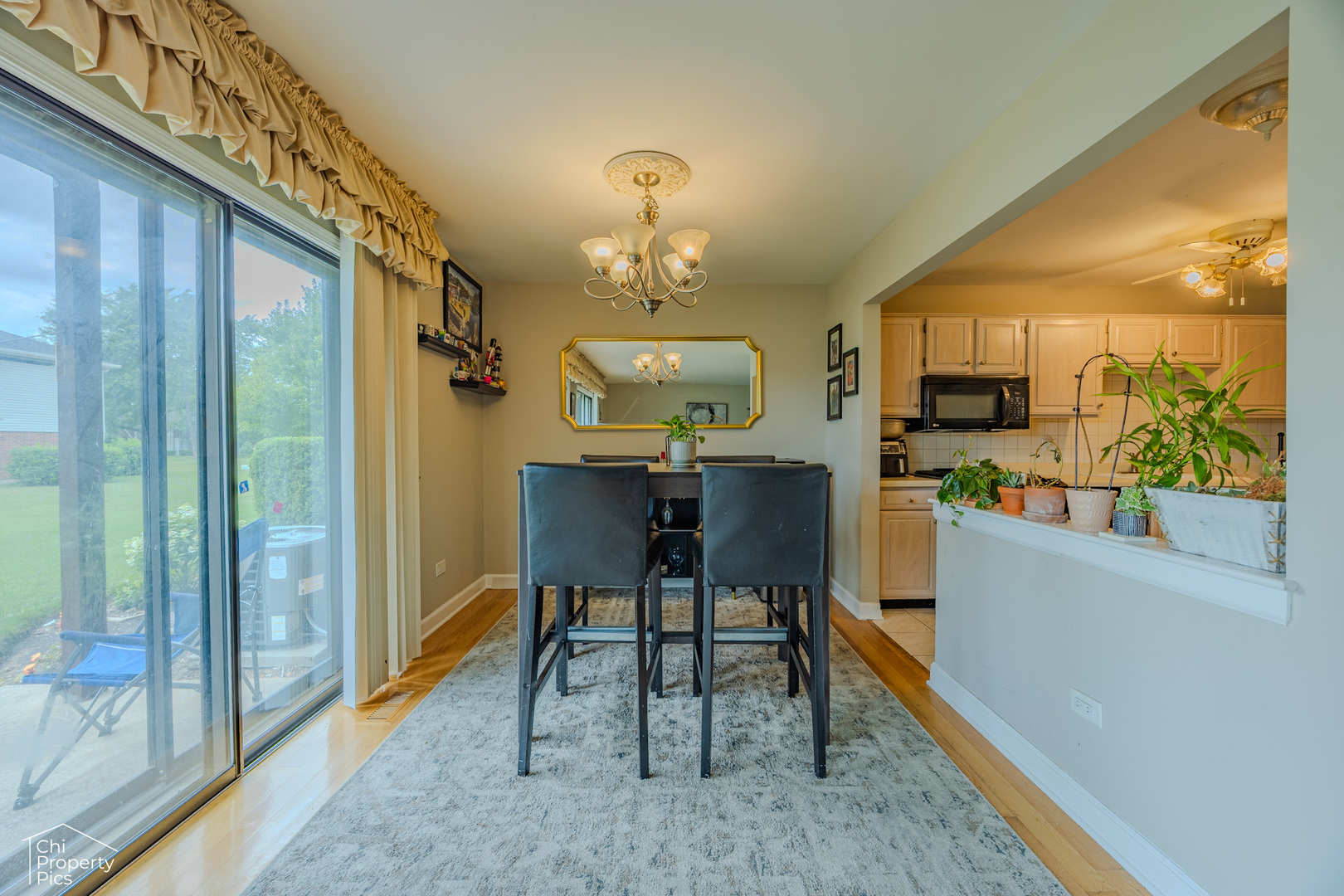 630 Cumberland Trail, Unit AA1 Roselle, IL 60172 - Photo 7 of 23 a view of a dining room with furniture window and outside view