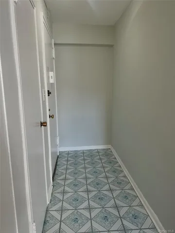 a view of a room with white door