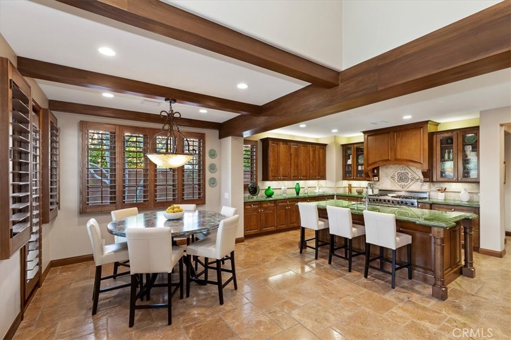 41 Cassis Circle Rancho Mirage, CA 92270 - Photo 22 of 74 a view of a dining room with furniture window and outside view