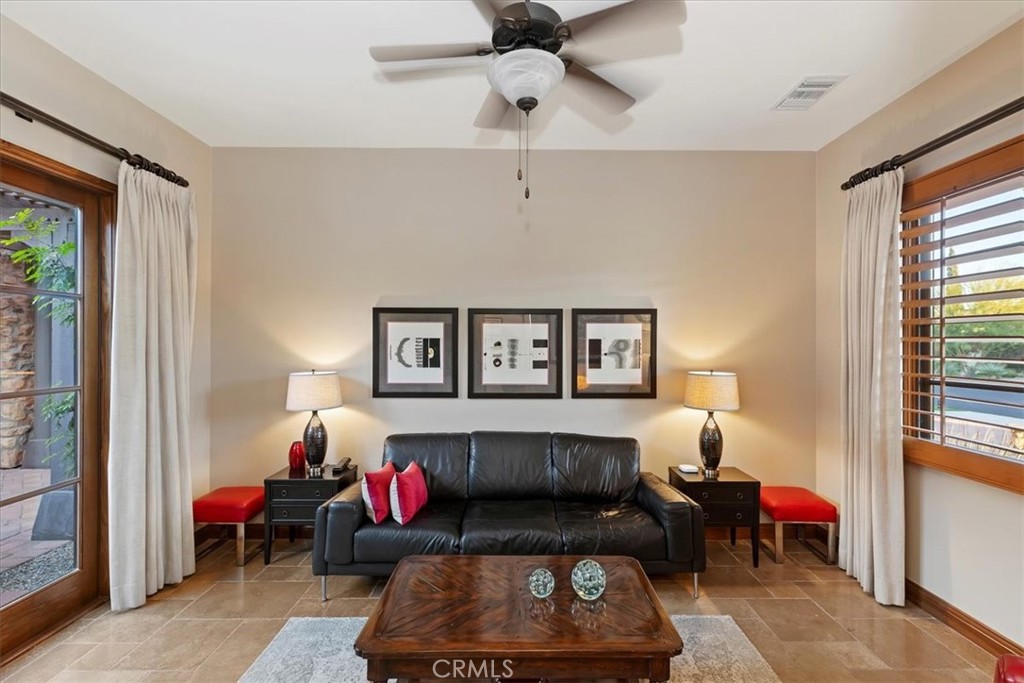 41 Cassis Circle Rancho Mirage, CA 92270 - Photo 37 of 74 a living room with furniture and a window