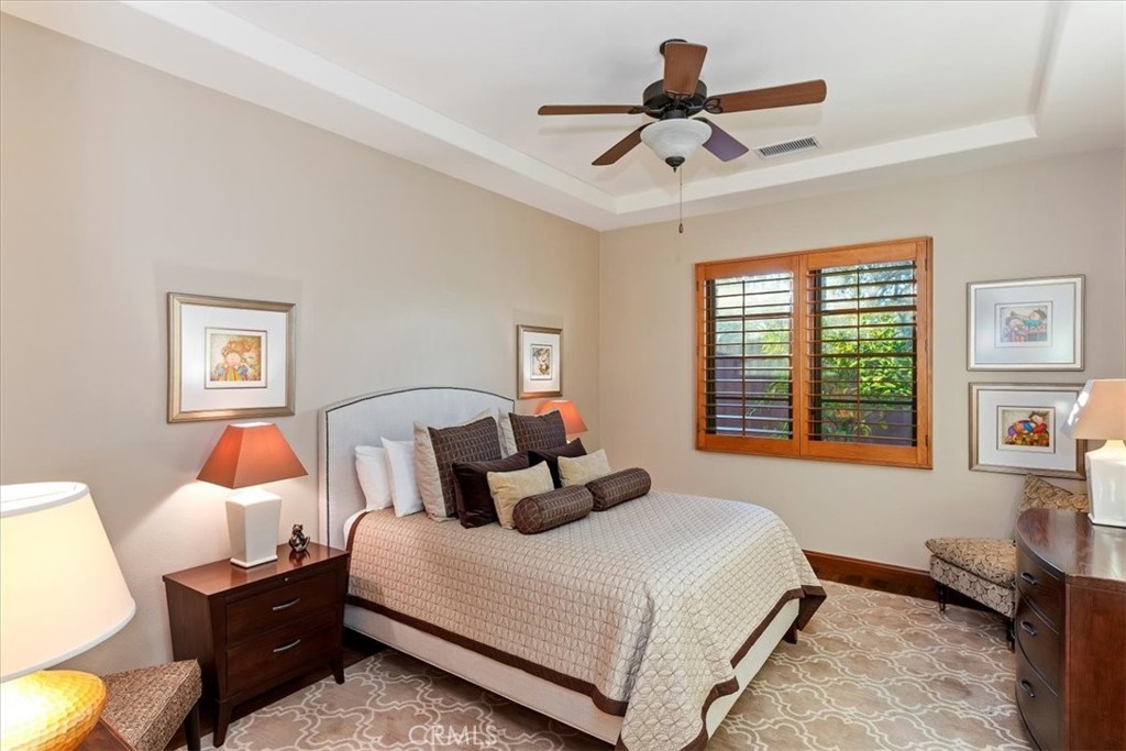 41 Cassis Circle Rancho Mirage, CA 92270 - Photo 40 of 74 a bedroom with bed and window