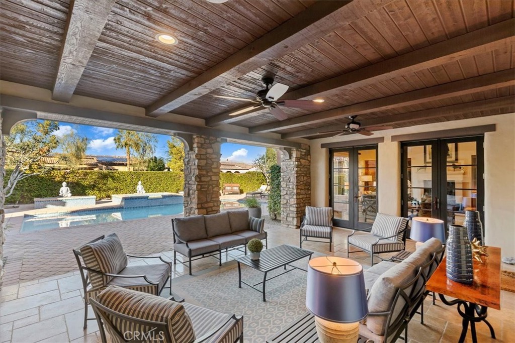 41 Cassis Circle Rancho Mirage, CA 92270 - Photo 47 of 74 a living room with fireplace furniture and a large window