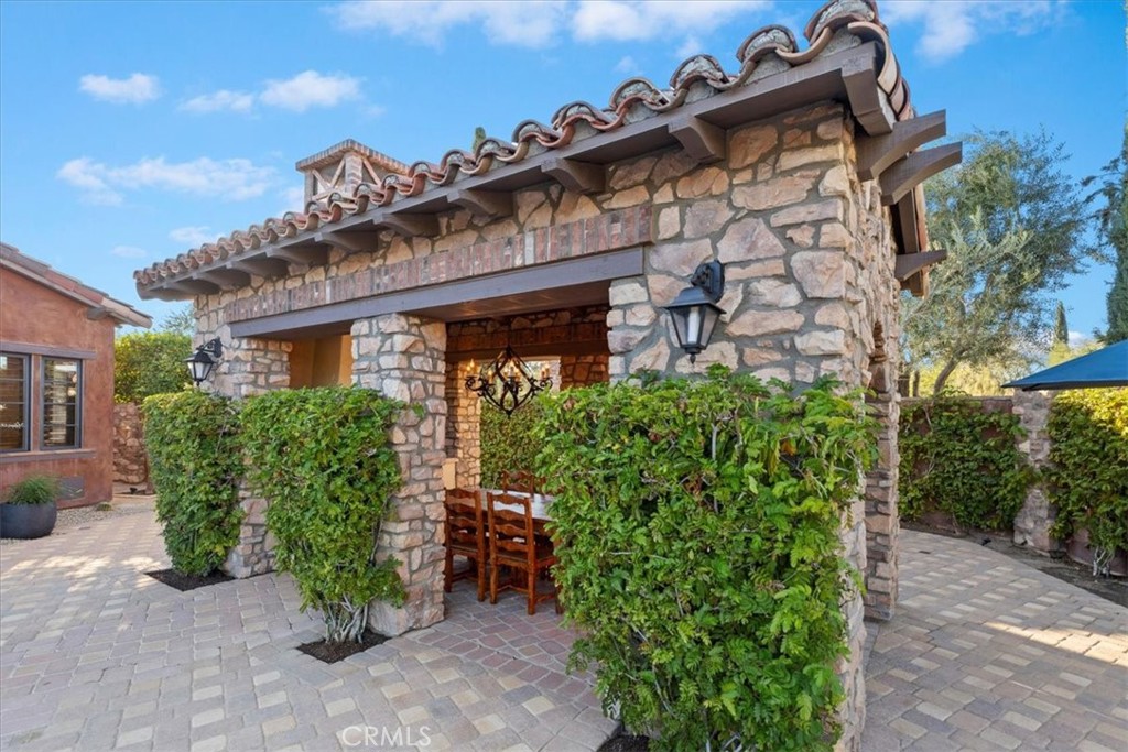 41 Cassis Circle Rancho Mirage, CA 92270 - Photo 51 of 74 front view of a house with a garden