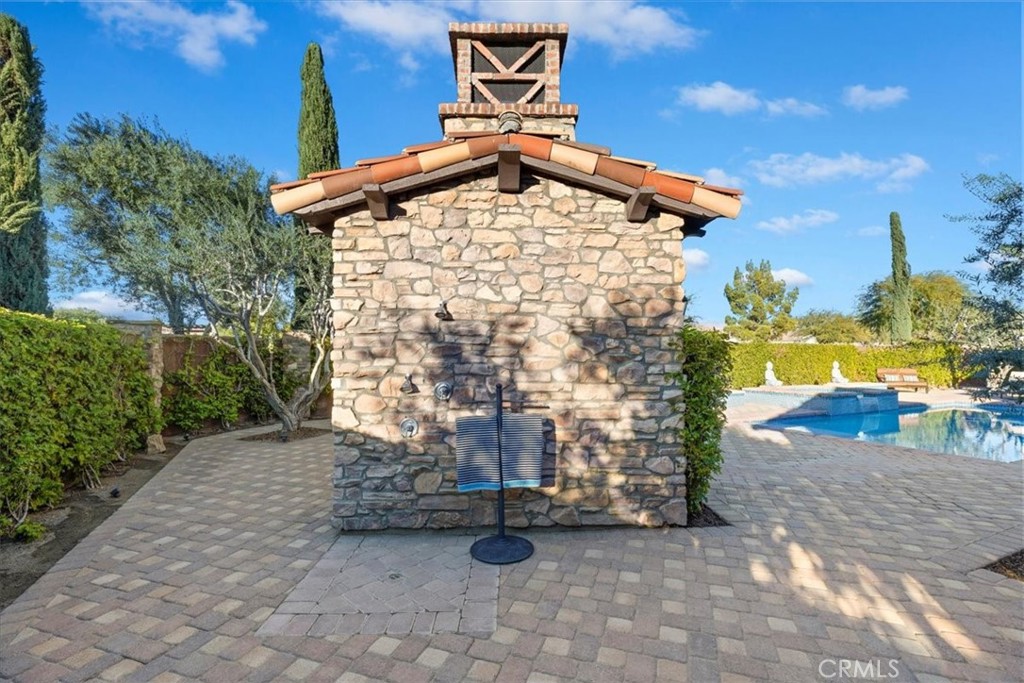 41 Cassis Circle Rancho Mirage, CA 92270 - Photo 53 of 74 a front view of a house with a yard