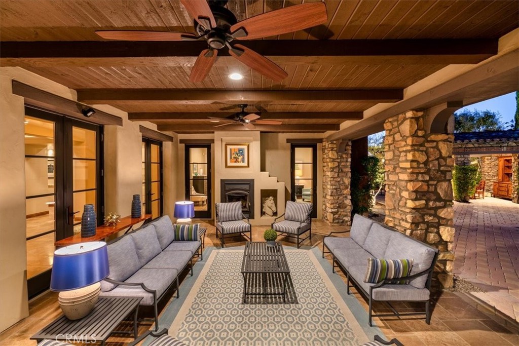 41 Cassis Circle Rancho Mirage, CA 92270 - Photo 67 of 74 a living room with furniture and a large window