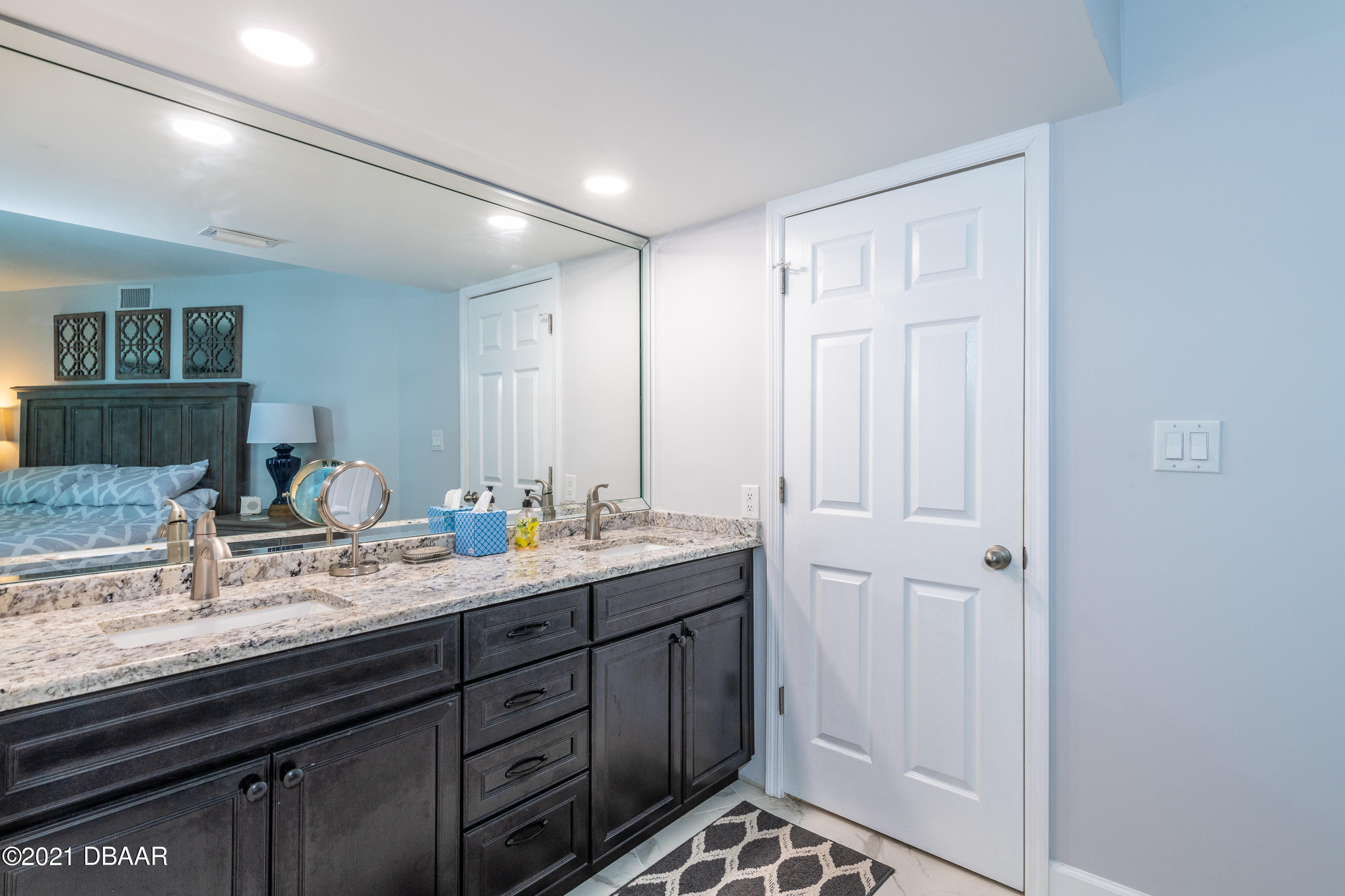 1275 Ocean Shore Boulevard, Unit 307 Ormond Beach, FL 32176 - Photo 11 of 24 a view of bathroom with dual sinks