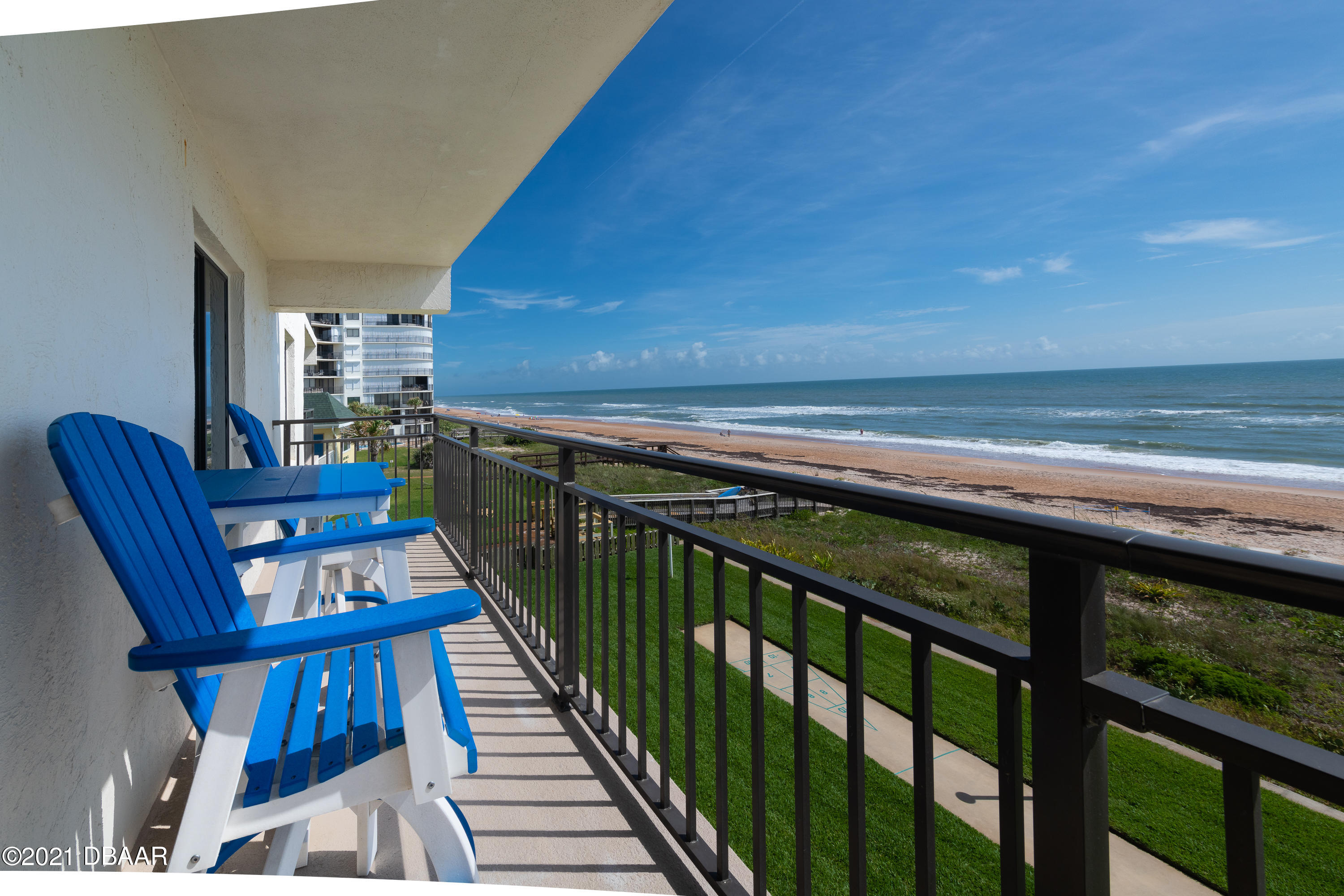 1275 Ocean Shore Boulevard, Unit 307 Ormond Beach, FL 32176 - Photo 20 of 24 a view of balcony with wooden floor and seating space