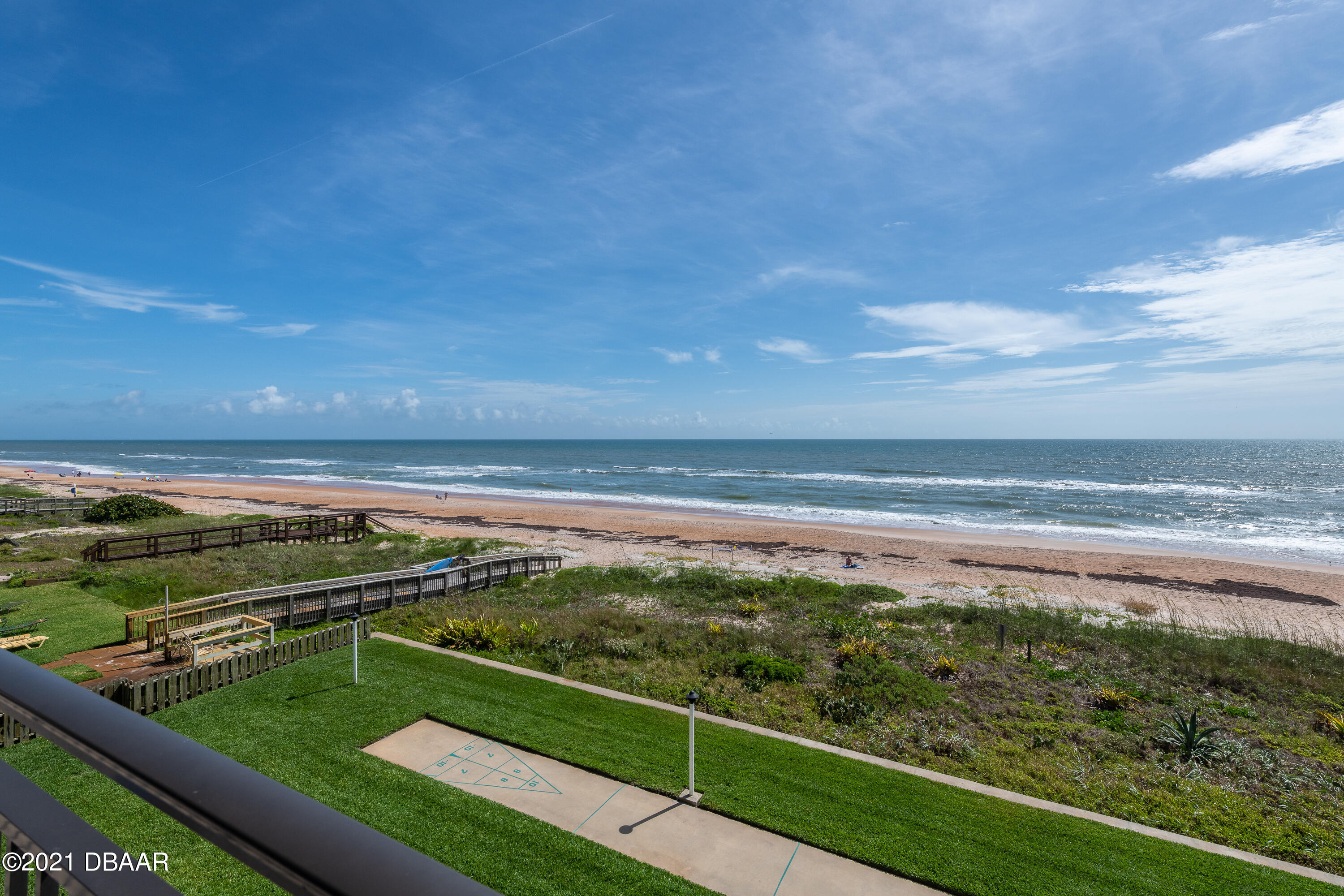 1275 Ocean Shore Boulevard, Unit 307 Ormond Beach, FL 32176 - Photo 21 of 24 a view of a garden and ocean