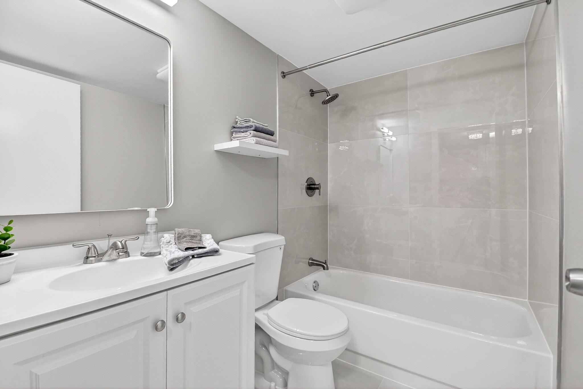 2018 Southwest 29th Court, Unit 642 Delray Beach, FL 33445 - Photo 20 of 23 a bathroom with a sink toilet tub and shower
