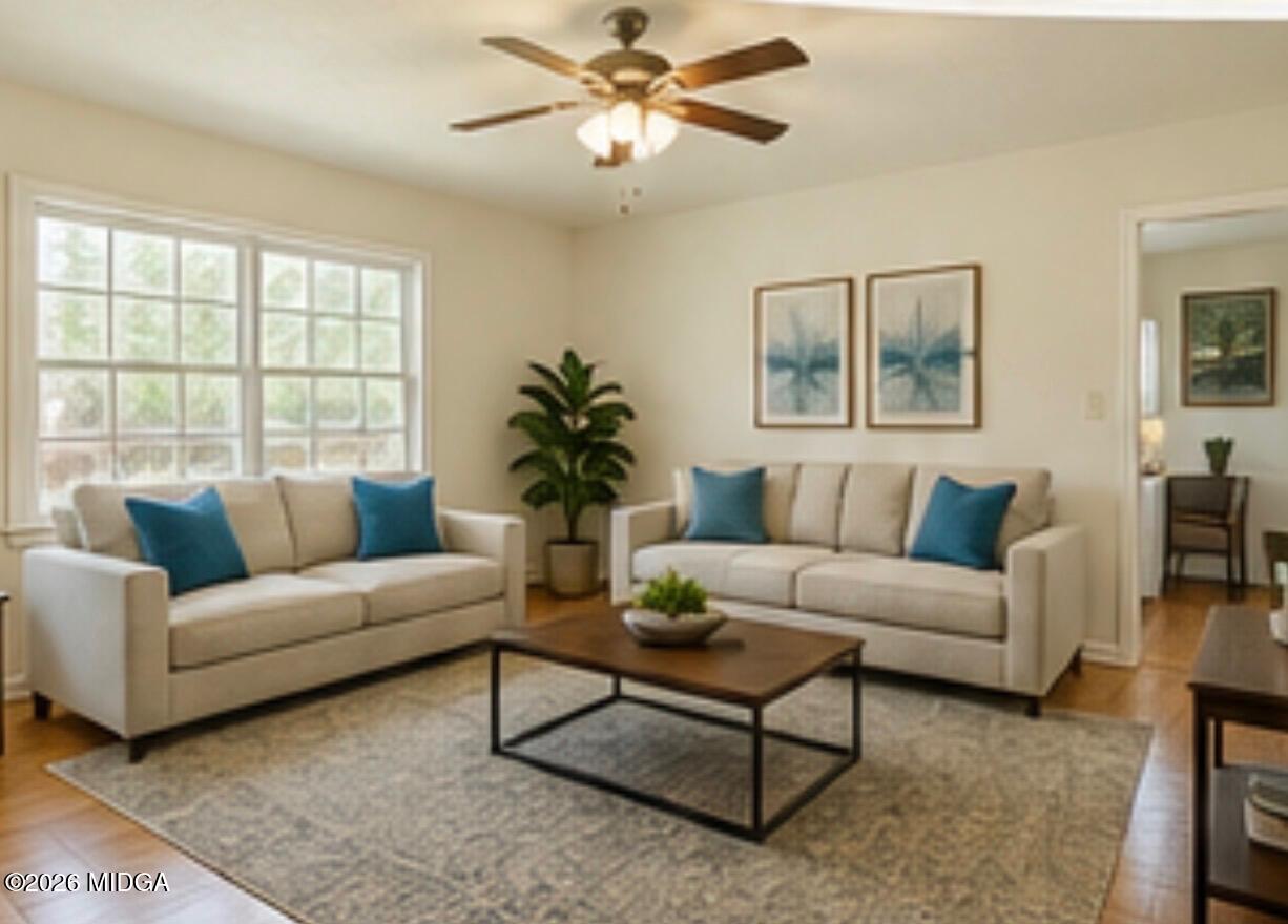 1624 Randall Road Macon, GA 31206 - Photo 2 of 5 a living room with furniture and a large window