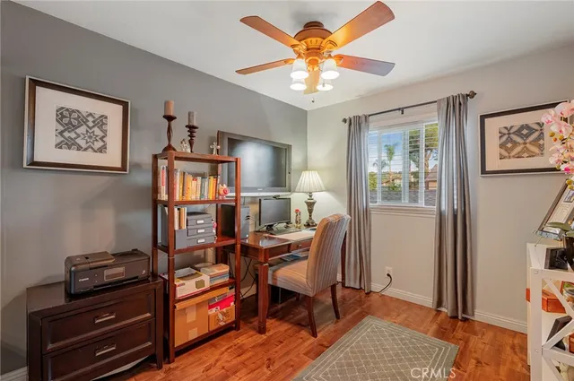 a work room with furniture and a window