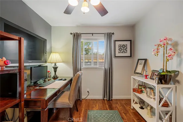 a workspace with furniture and window