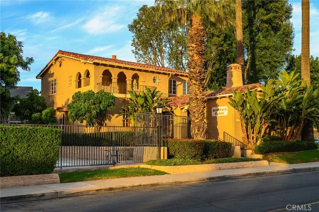 a view of a house with a street