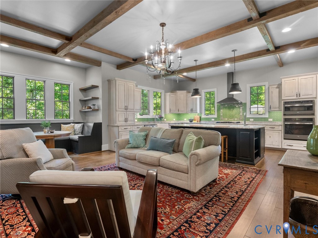 16131 Binley Road Midlothian, VA 23112 - Photo 28 of 99 a living room with furniture chandelier and a fireplace