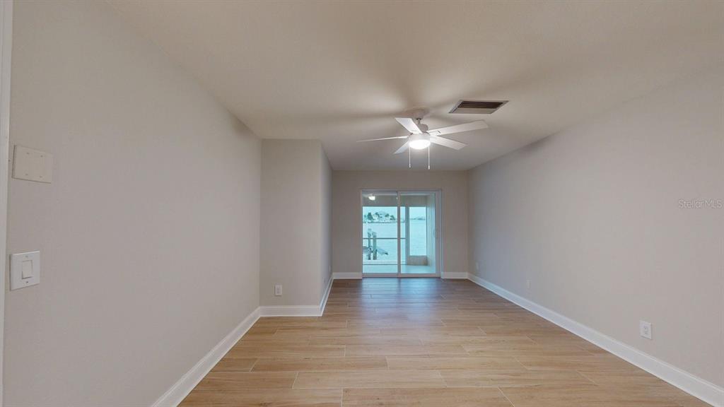 636 Boca Ciega Point Boulevard South St. Petersburg, FL 33708 - Photo 40 of 96 a view of an empty room with a window