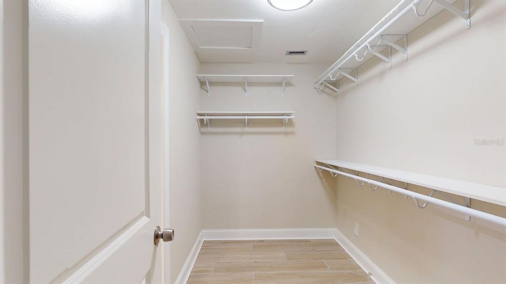 636 Boca Ciega Point Boulevard South St. Petersburg, FL 33708 - Photo 45 of 96 a view of walk in closet with empty racks