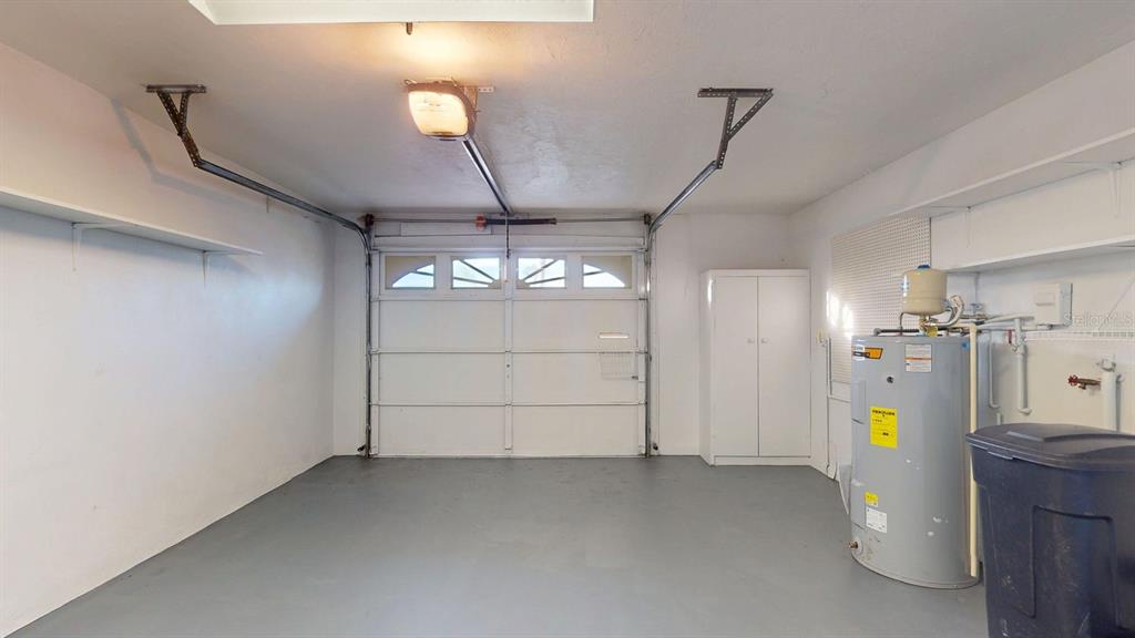 636 Boca Ciega Point Boulevard South St. Petersburg, FL 33708 - Photo 84 of 96 a view of empty room with a ceiling fan and window
