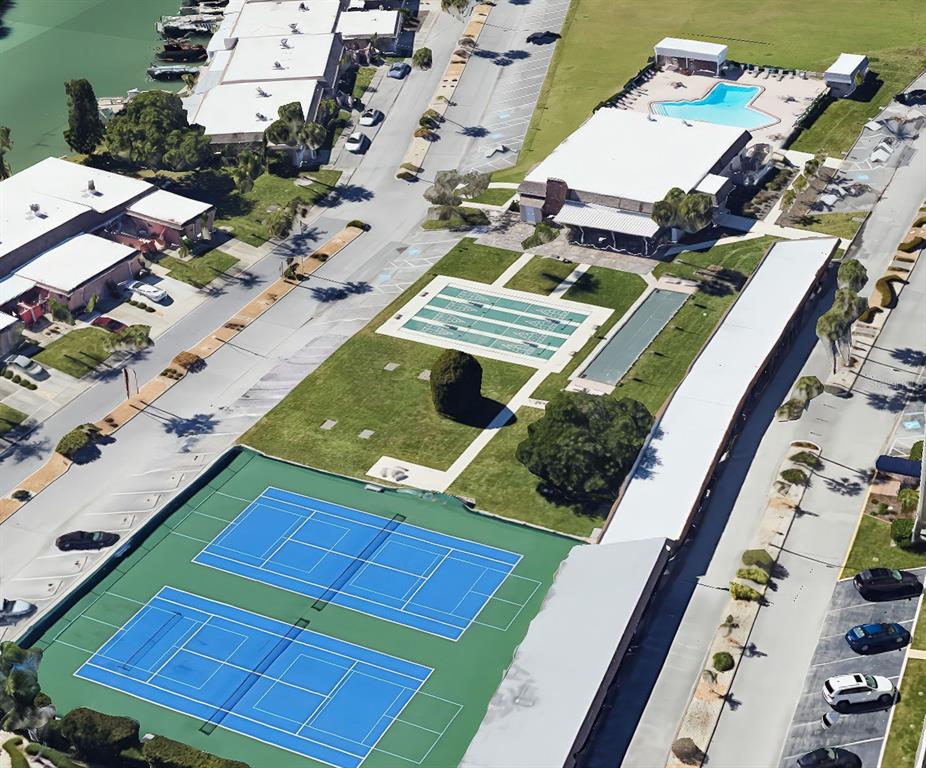 636 Boca Ciega Point Boulevard South St. Petersburg, FL 33708 - Photo 95 of 96 an aerial view of a tennis ground