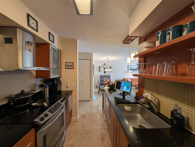 a living room with furniture a couch and a flat screen tv