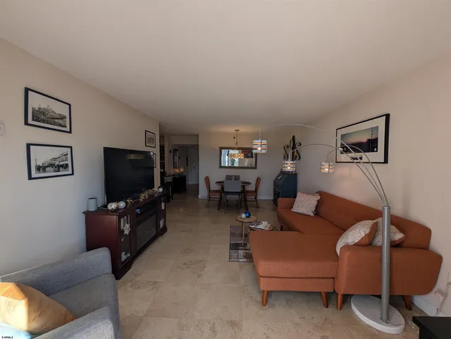 a kitchen with a table and chairs