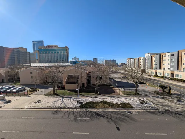 a view of a balcony with chairs