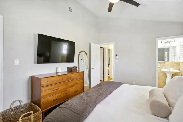 a bathroom with a sink a mirror and a toilet