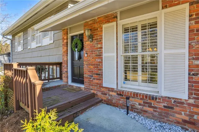 a house view with a backyard space