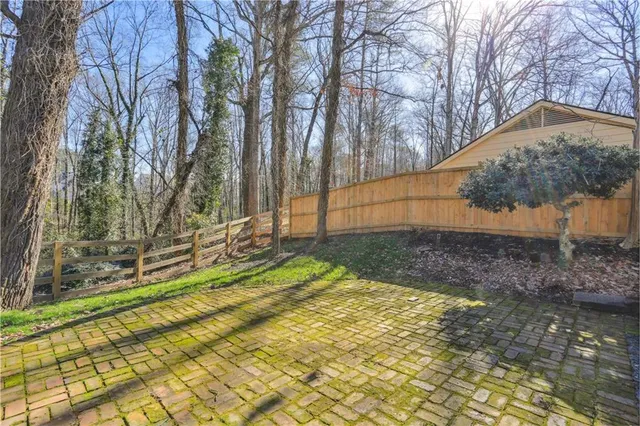a view of backyard with tree