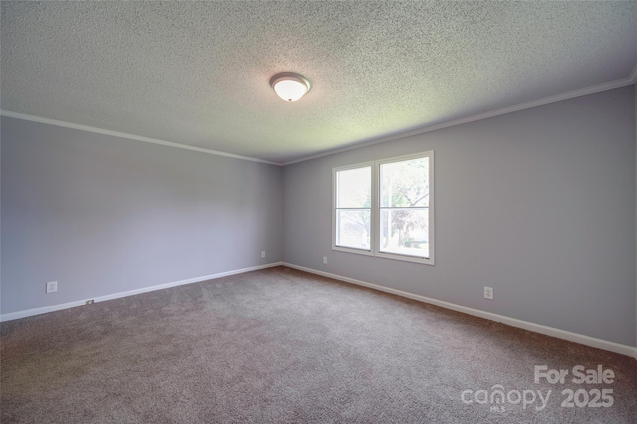355 Shoreline Road New London, NC 28127 - Photo 8 of 22 an empty room with a window