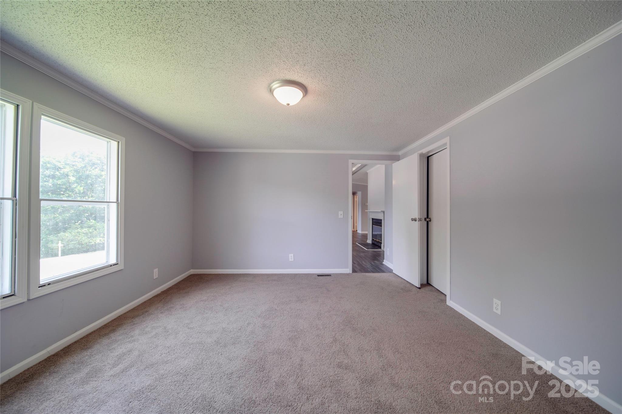 355 Shoreline Road New London, NC 28127 - Photo 9 of 22 a view of an empty room with a window