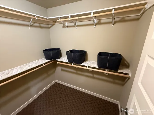 a bathroom with a sink double vanity and a mirror