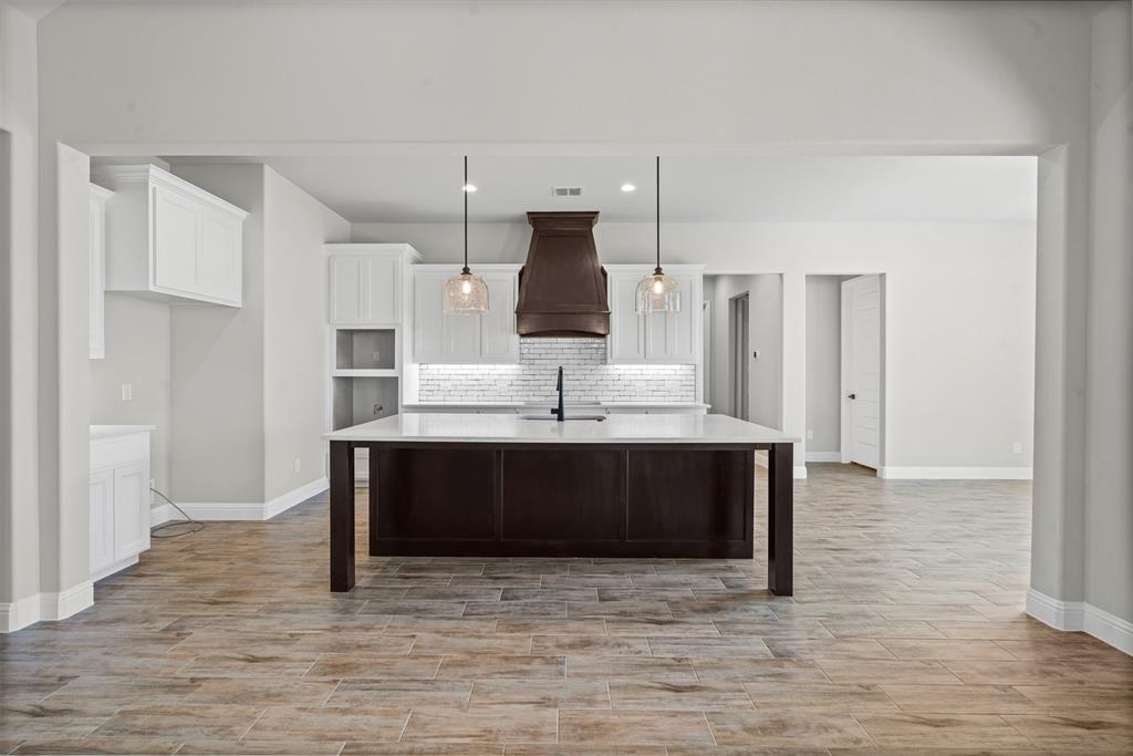 1005 Lilly Lane Weatherford, TX 76088 - Photo 10 of 34 a view of living room with furniture and wooden floor