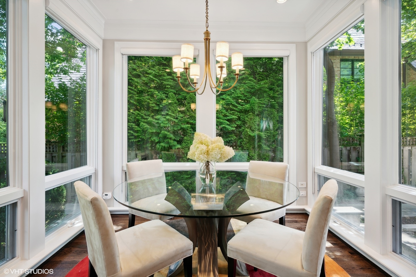 325 Richmond Road Kenilworth, IL 60043 - Photo 14 of 49 a dining room with furniture a chandelier and wooden floor