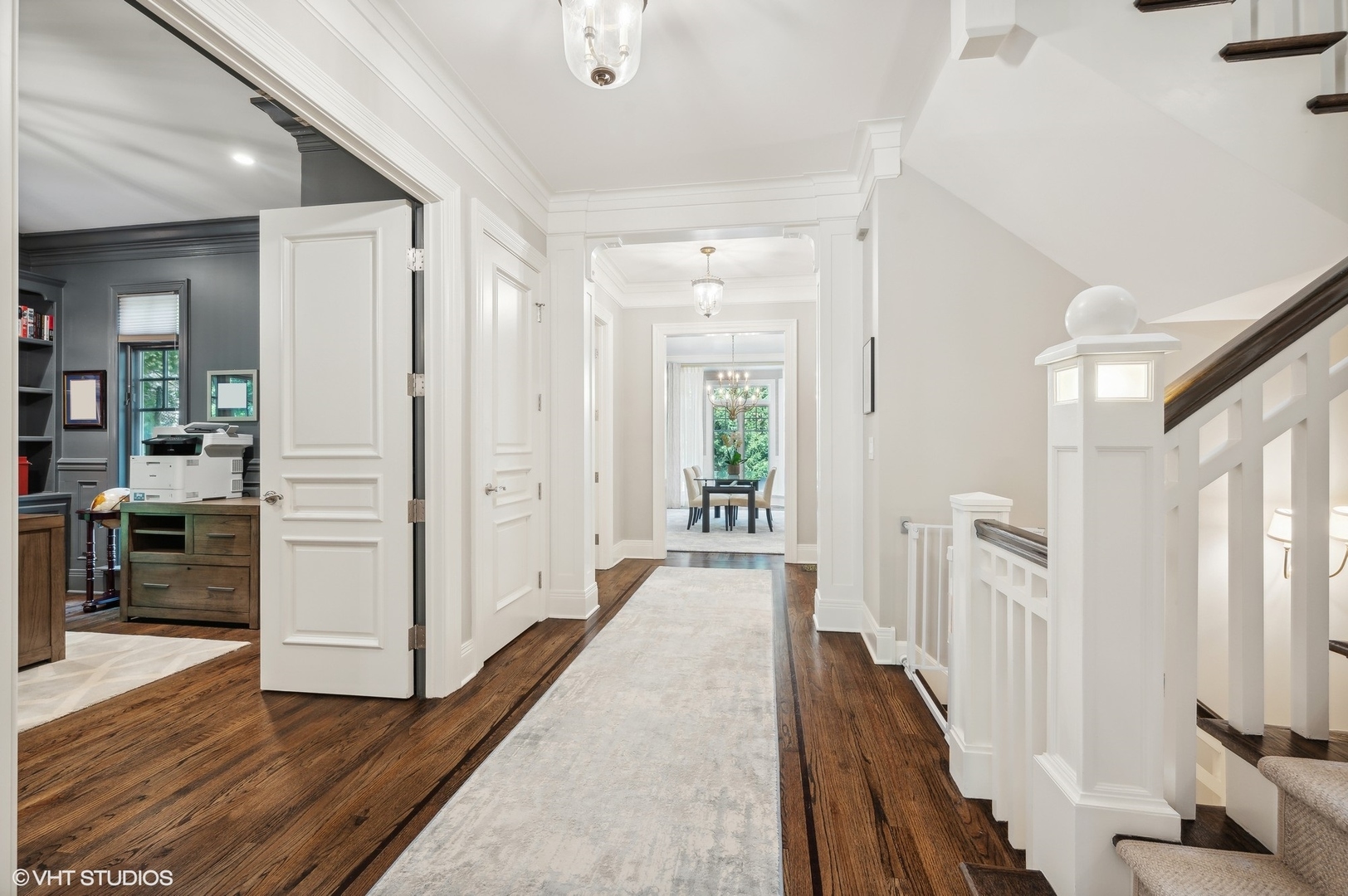 325 Richmond Road Kenilworth, IL 60043 - Photo 5 of 49 a view of a hallway with wooden floor and dining room