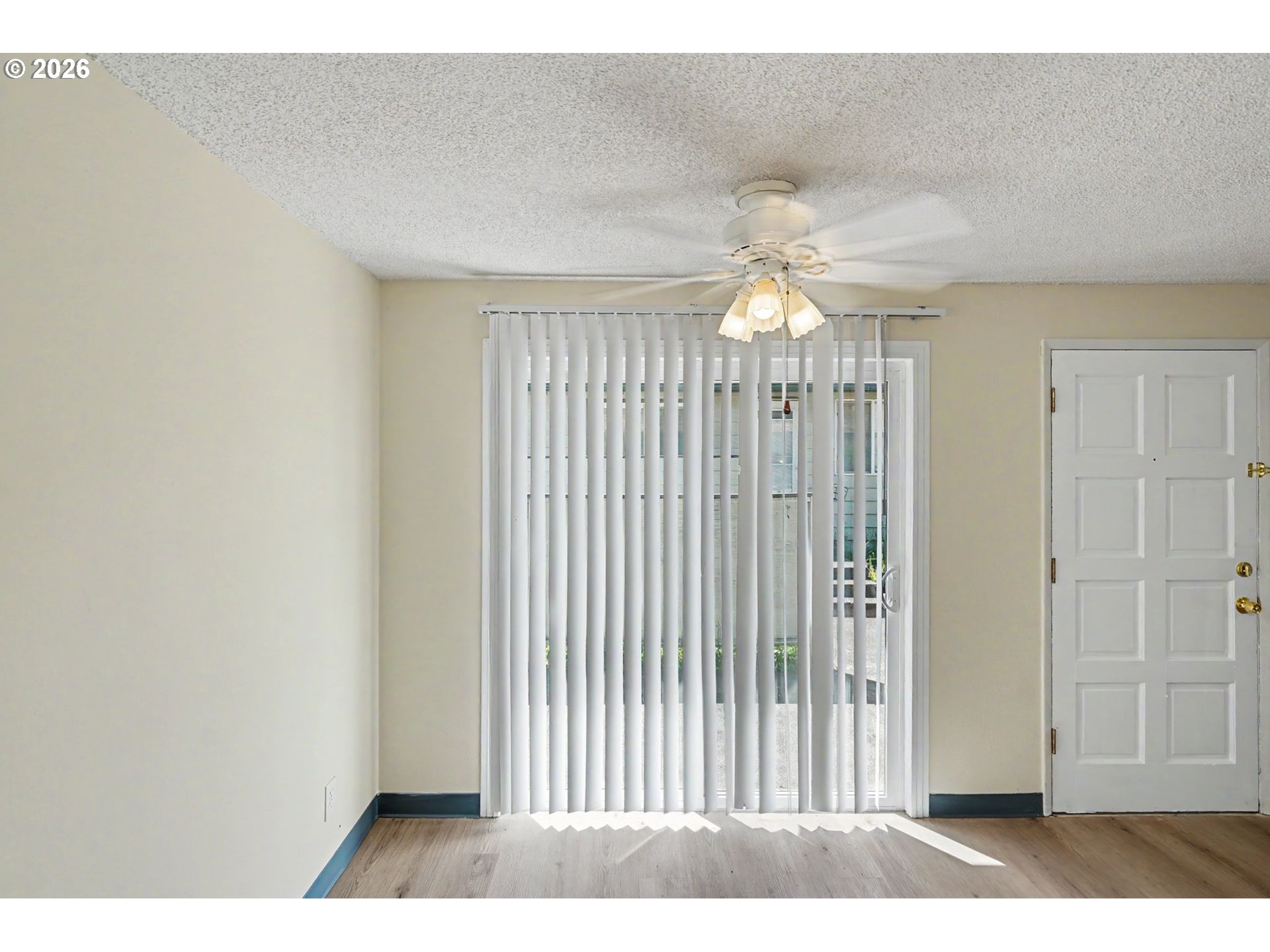 777 Boone Road Southeast, Unit 12 Salem, OR 97302 - Photo 7 of 16 a view of a livingroom with a chandelier fan