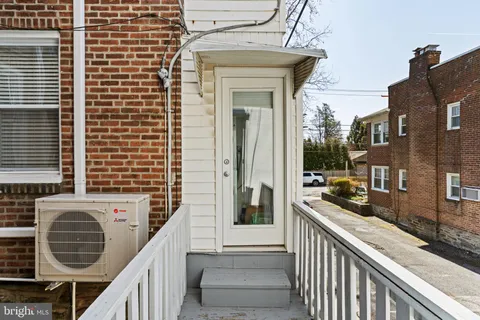a building with a window and balcony