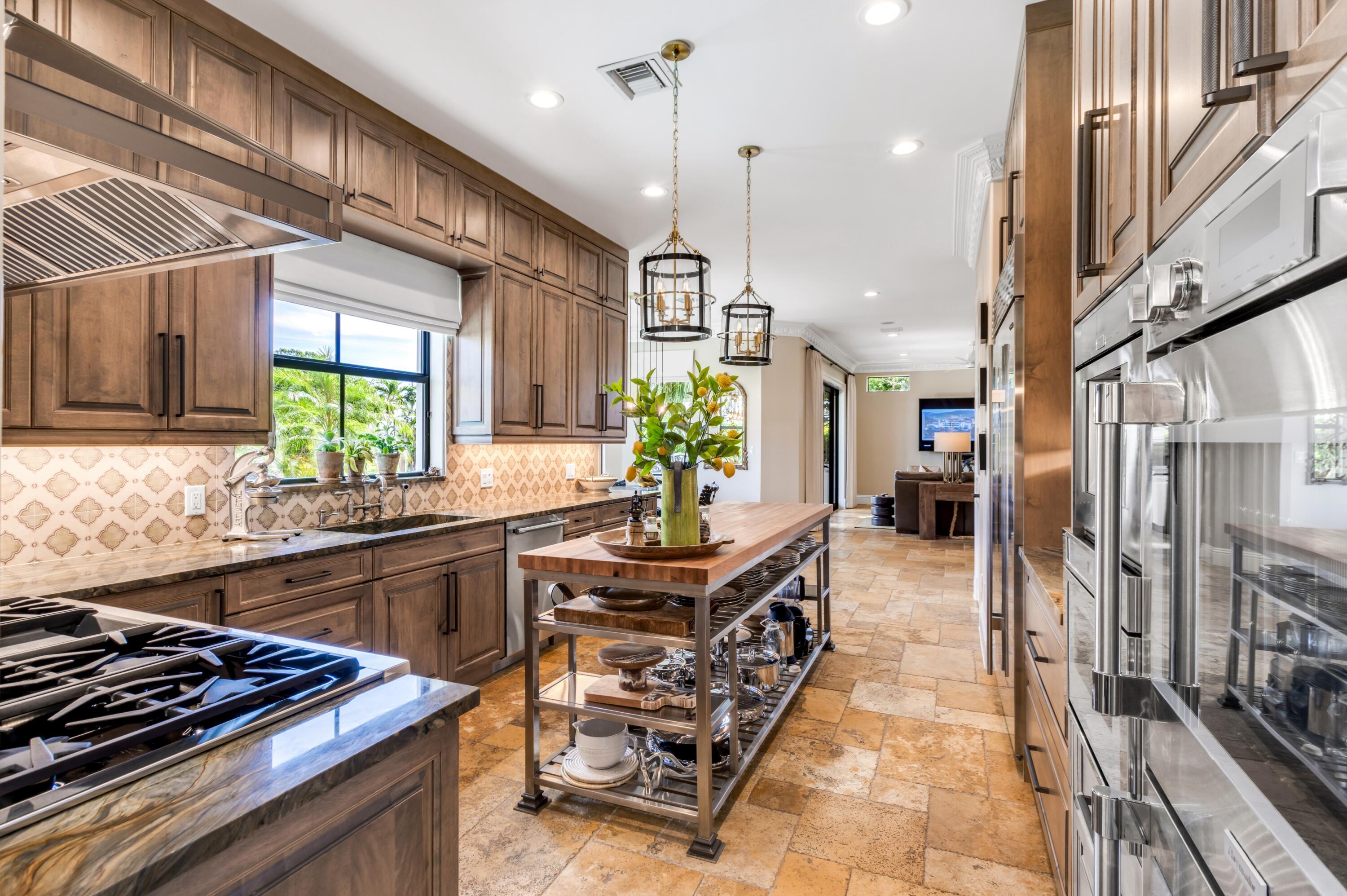 809 Northeast 71st Street Boca Raton, FL 33487 - Photo 12 of 43 mls_KITCHEN_ANGLE_LOOKING_OUT