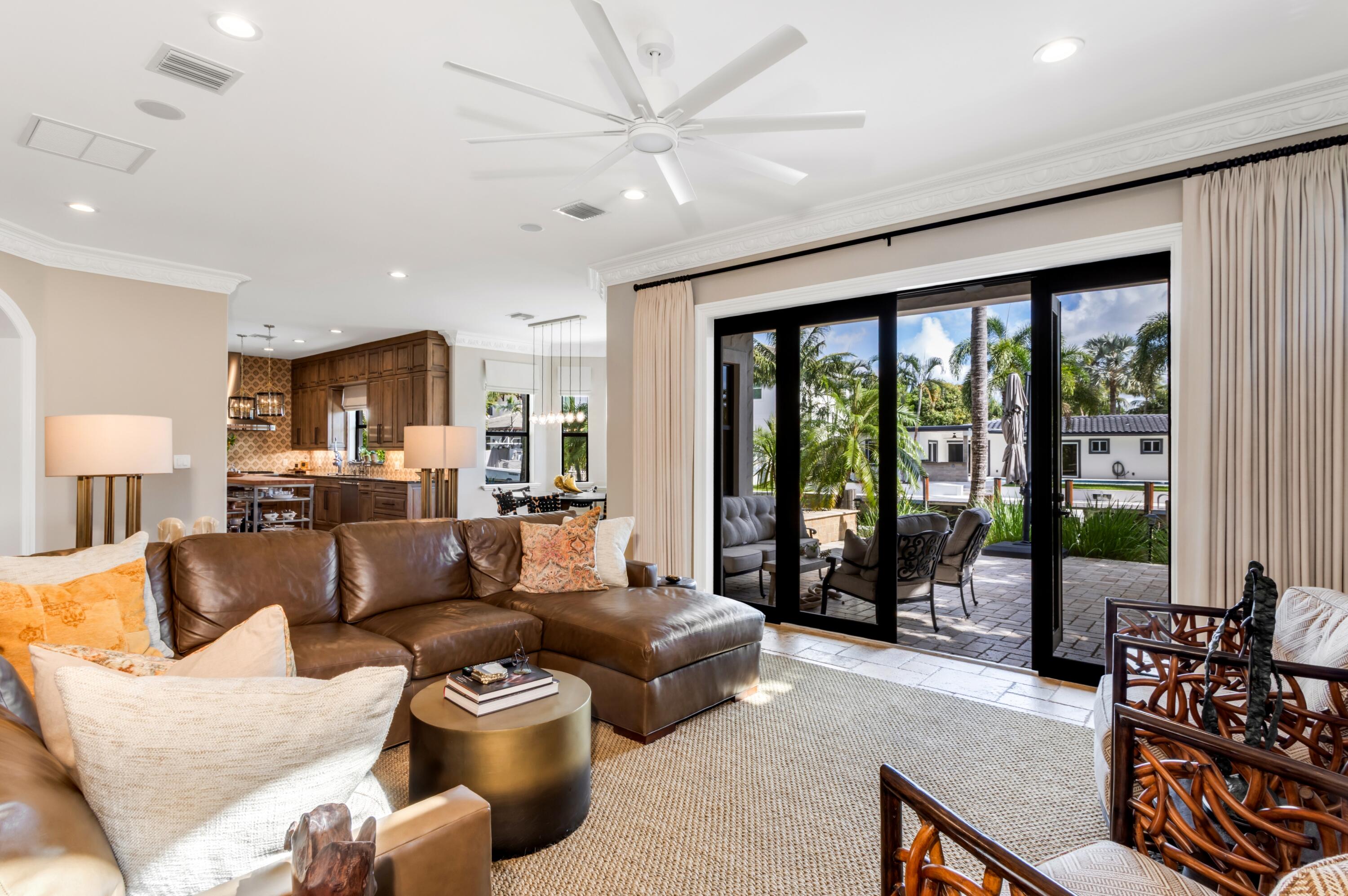 809 Northeast 71st Street Boca Raton, FL 33487 - Photo 16 of 43 mls_FAMILY_TO_KITCHEN_LOOKING_OUT