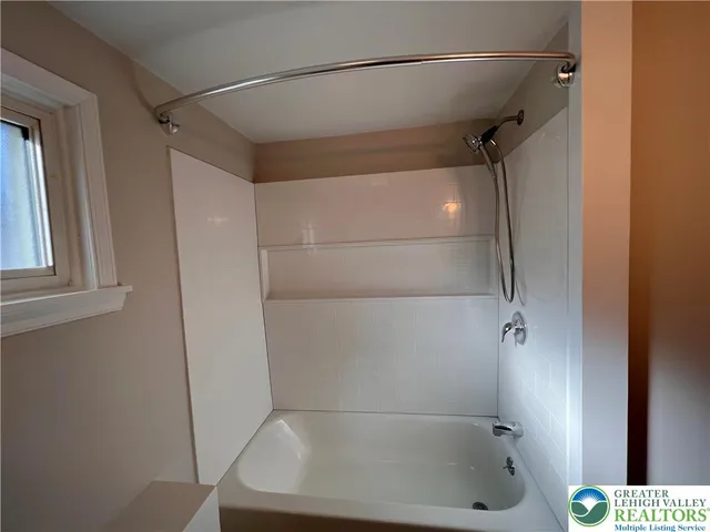 a bathroom with a tub