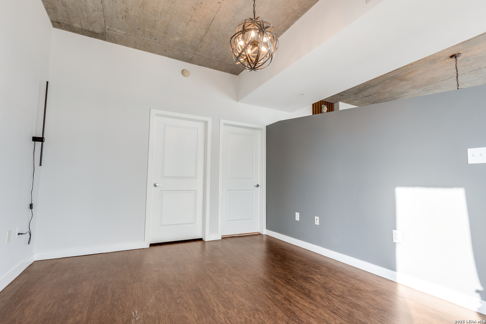 5925 Almeda Road, Unit 11710 Houston, TX 77004 - Photo 17 of 25 a view of an empty room with wooden floor