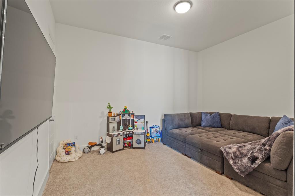 5009 Duck Cv Circle Royse City, TX 75189 - Photo 15 of 34 a living room with furniture and a couch