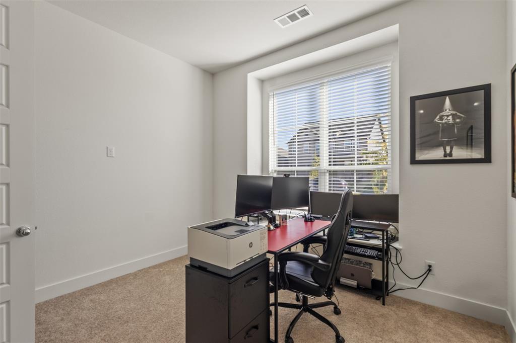 5009 Duck Cv Circle Royse City, TX 75189 - Photo 18 of 34 a view of a workspace with furniture and a window