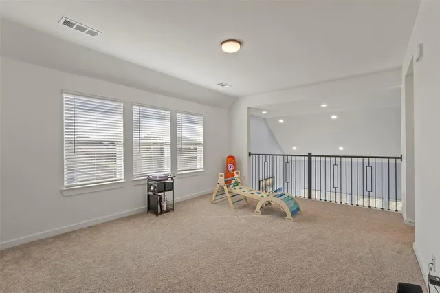 a view of a workspace with furniture