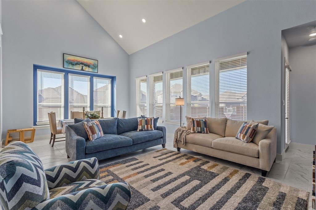 5009 Duck Cv Circle Royse City, TX 75189 - Photo 5 of 34 a living room with furniture and a large window