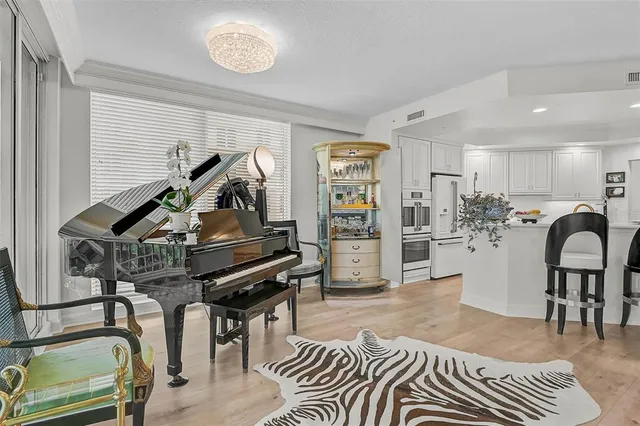 a kitchen with counter top space cabinets and stainless steel appliances